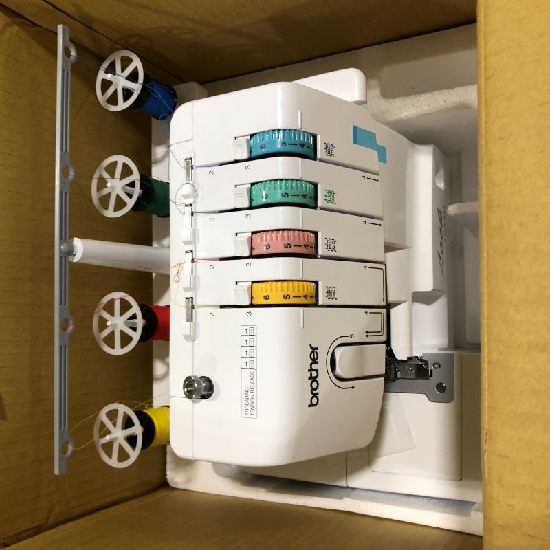 Photo 1 of Brother Serger, 1034D, Heavy-Duty Metal Frame Overlock Machine, 1,300 Stitches Per Minute, Removeable Trim Trap, 3 Included Accessory Feet,White