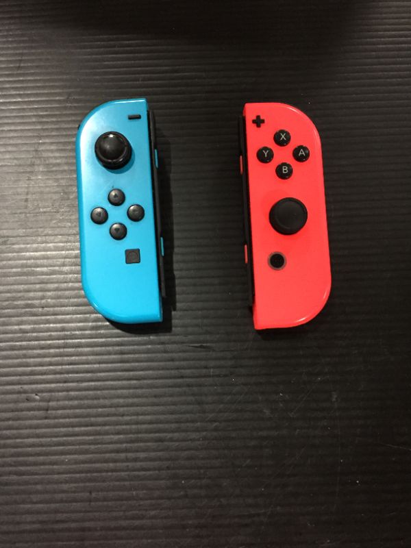 Photo 2 of Switch Joycon, Joycon Controller for Switch/Lite/OLED, Replacement for Joy Con Support Wake-up/Vibration Function and 6-Axis Gyroscope, L/R Joy Cons with Wrist Straps (Blue and Red) MISSING TOP PARTS WITH STRAPS
