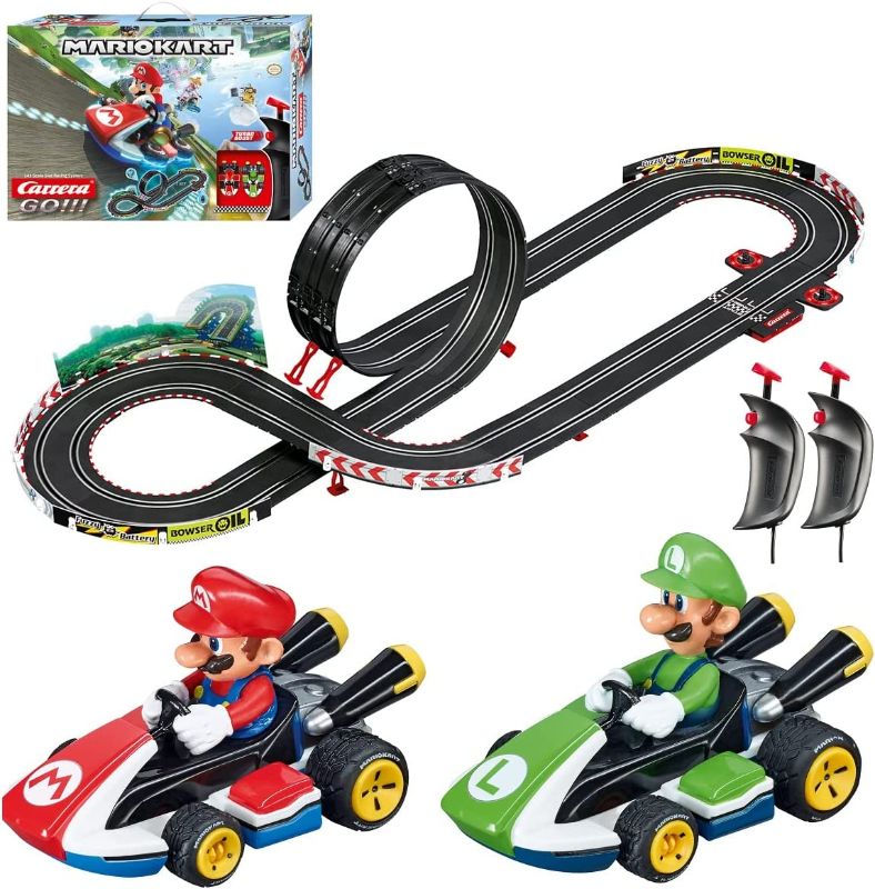 Photo 1 of Carrera GO!!! 62491 Mario Kart Electric Powered Slot Car Racing Kids Toy Race Track Set Includes 2 Hand Controllers Featuring Mario Versus Luigi in 1:43 Scale
