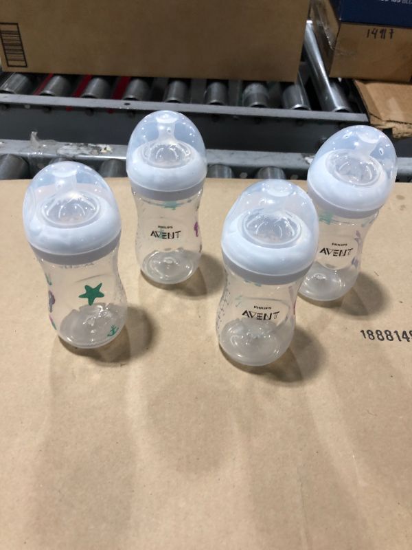 Photo 1 of Philips AVENT Natural Baby Bottle with Natural Response Nipple, Clear, 9oz, 4pk, SCY903/04
