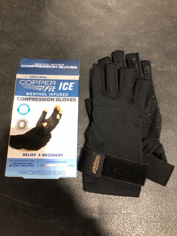 Photo 3 of Copper Fit ICE Compression Gloves Infused with Menthol and Coq10 for Recovery, Black
SIZE L/XL.