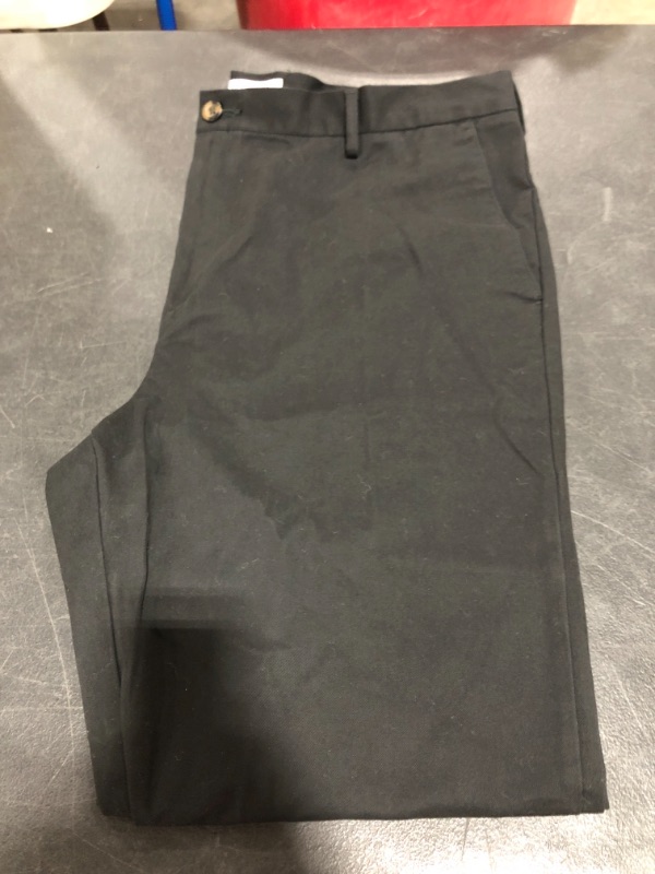 Photo 1 of AMAZON ESSENTIALS MEN'S BLACK KHAKI PANT, SIZE 40 X 34. PRIOR USE.