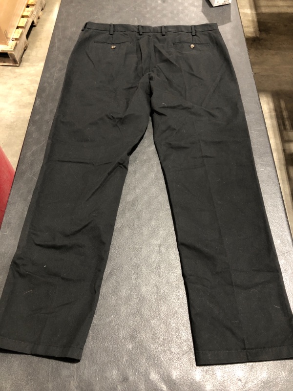 Photo 3 of AMAZON ESSENTIALS MEN'S BLACK KHAKI PANT, SIZE 40 X 34. PRIOR USE.