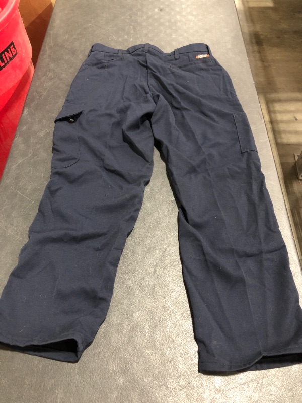 Photo 4 of Bulwark Flame Resistant 7oz CoolTouch Cargo Pocket Work Pants. NAVY BLUE.
SIZE 34. PRIOR USE. PHOTO FOR REFERENCE.