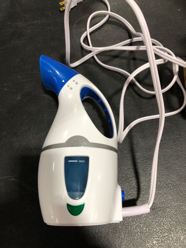 Photo 4 of Conair CompleteSteam 1100 Watt Handheld Fabric Steamer, White/Blue. PRIOR USE.
