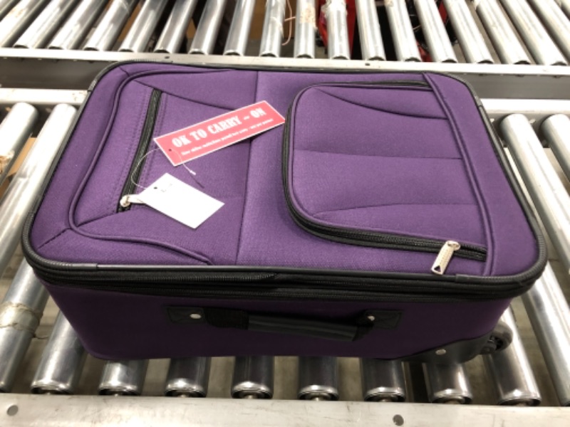 Photo 1 of ROCKLAND 14 INCH CARRY-ON SUITCASE. PURPLE.