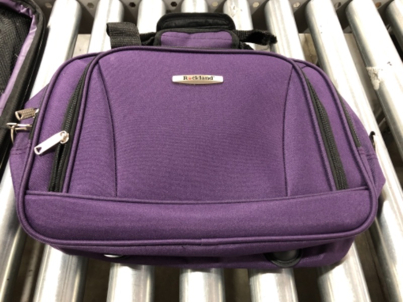 Photo 4 of ROCKLAND 14 INCH CARRY-ON SUITCASE. PURPLE.