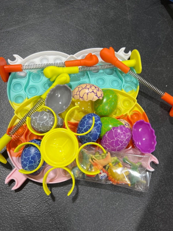 Photo 2 of Kids Toys Pop Its Dinosaur Eggs Games Easter Toys Games for Boys Girls Gifts It Party Favors for Kids Adults Autism ADHD Stress Relief, Silicone Push Bubble Sensory Toys
