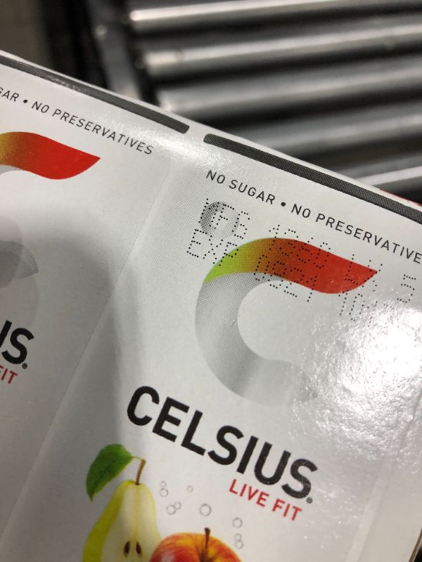Photo 2 of CELSIUS Essential Energy Drink 12 Fl Oz, Sparkling Fuji Apple Pear (pack of 4) ( 2 packs) exp. 08/2021