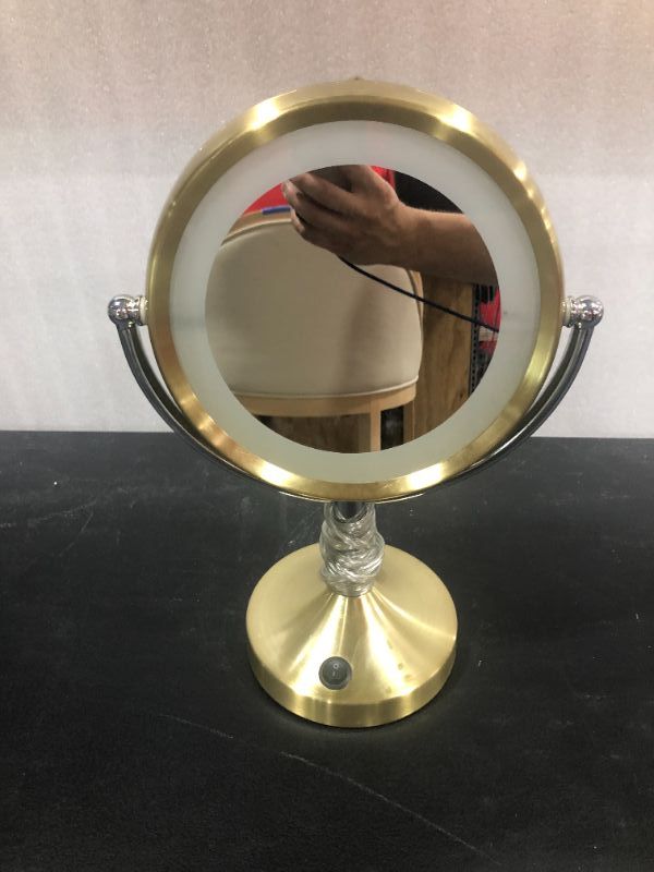 Photo 1 of GOLD LED MAKEUP MIRROR  H15 x W11 inches
2 pack
Normal Wear and Tear, Minor Scratches and scuffs, Dirty from previous usage, minor damage to the lampshade 
