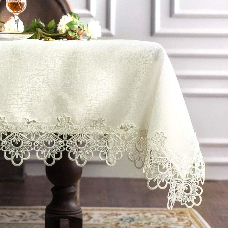 Photo 1 of ARTABLE Rectangular Lace Fabric Tablecloth with Macrame Border Clear Embroidered Kitchen Tablecloths for Elegant Holiday Long Dinner Tables (Ivory, Tablecloth 52" x 70")
