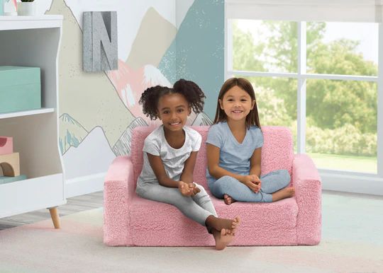 Photo 1 of Delta Children Cozee Flip-Out Sherpa 2-in-1 Convertible Sofa to Lounger for Kids, PINK