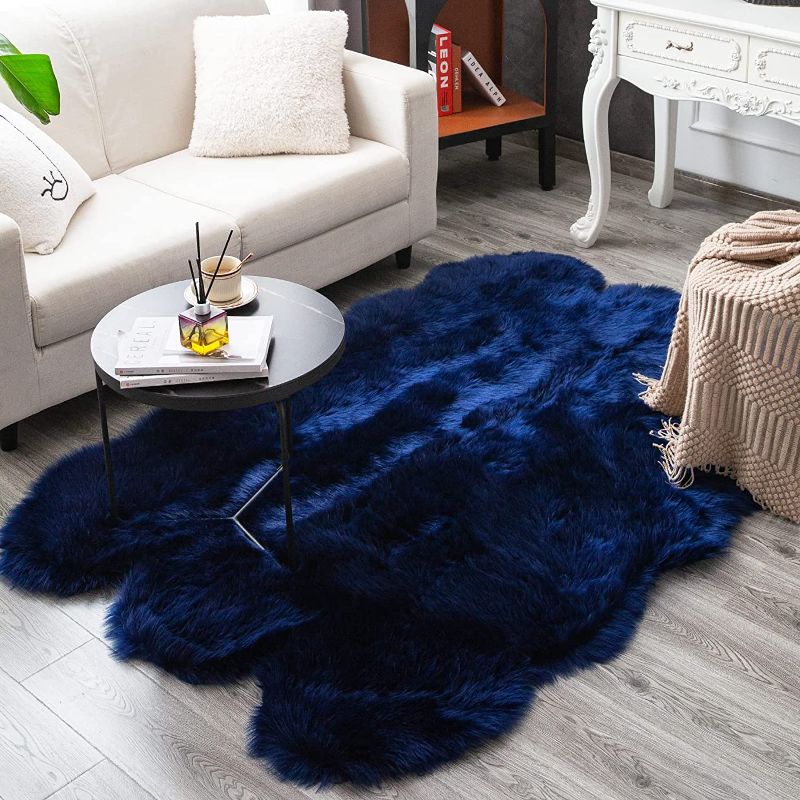 Photo 1 of Carvapet Soft Fluffy Rugs Faux Fur Sheepskin Area Rug for Bedroom Floor Mat Carpet for Living Room Nursery 4 x 6 Feet,Navy Blue
