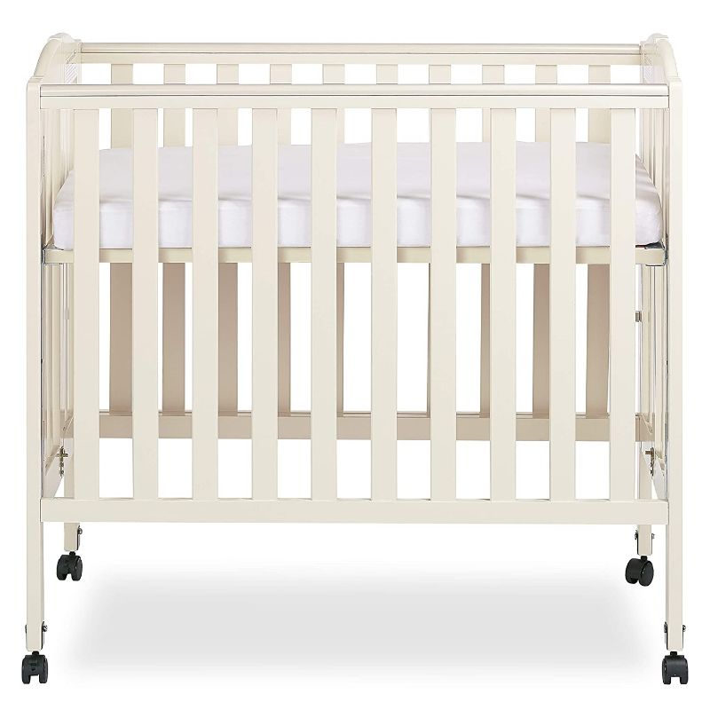 Photo 1 of Dream On Me 3-in-1 Folding Portable Crib in French White, Greenguard Gold Certified
