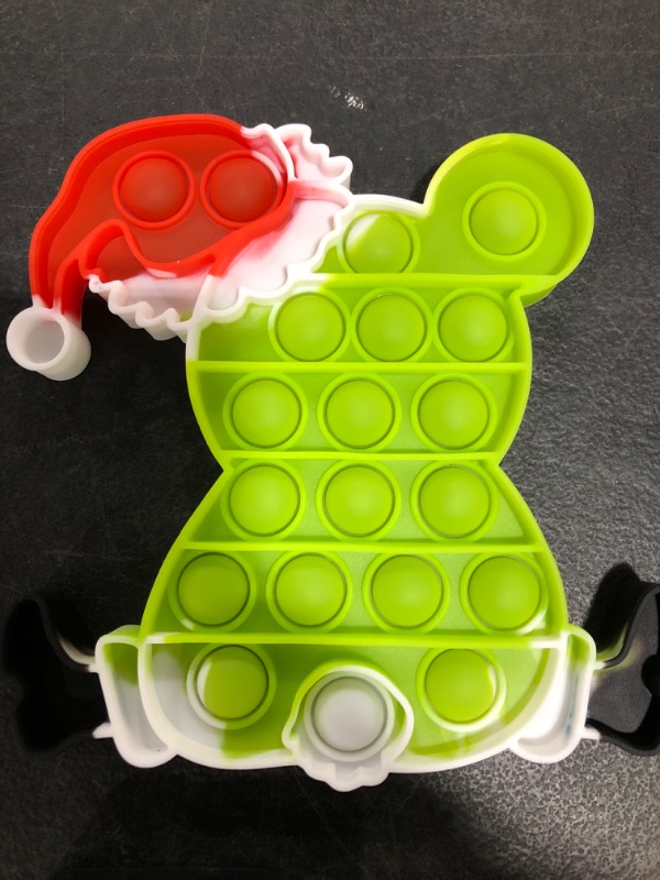 Photo 3 of CHRISTMAS HOLIDAY THEMED PUSH POP SILICONE RUBBER FIDGET SENSORY TOYS. PACKAGE OF 6 ITEMS.