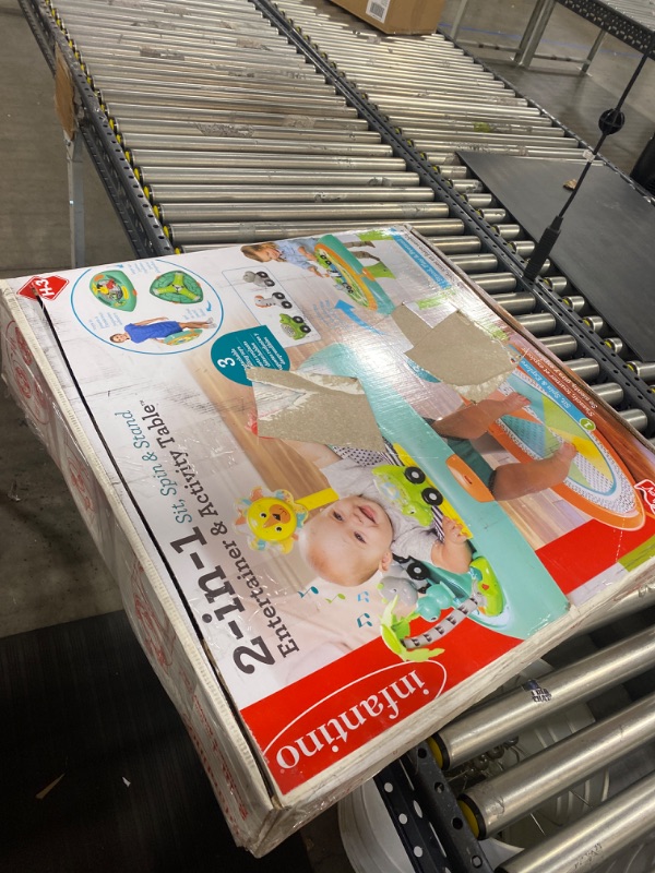 Photo 1 of Infantino Sit, Spin & Stand Entertainer 360 Seat & Activity Table

