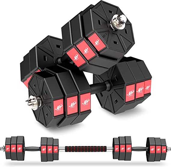 Photo 1 of Adjustable weight dumbbell set.