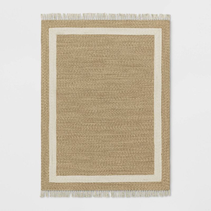 Photo 1 of 5' X 7'' Braided Outdoor Rug with Fringe Neutral/Ivory 