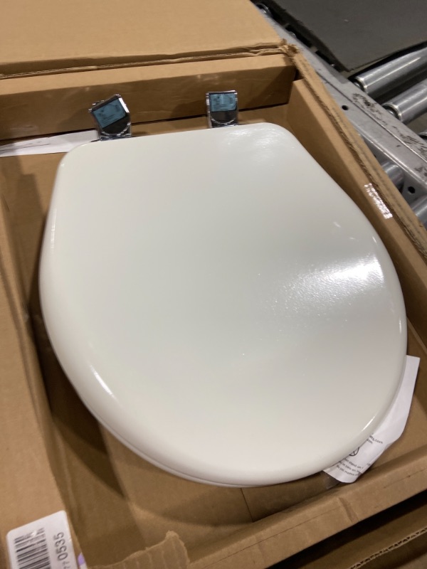 Photo 3 of BEMIS Chrome Slow Close Round Closed Front Toilet Seat in White