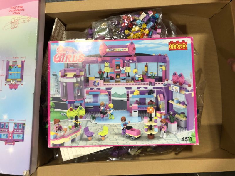 Photo 3 of Dream Girls Friends Shopping Mall Building Set 810 PCS Shopping Centre Building Kit with 7 Mini Dolls, Handbags Clothes Shore Girls Fashion Role Play Buildable Mall Toys for Kids Aged 8-12 and up
