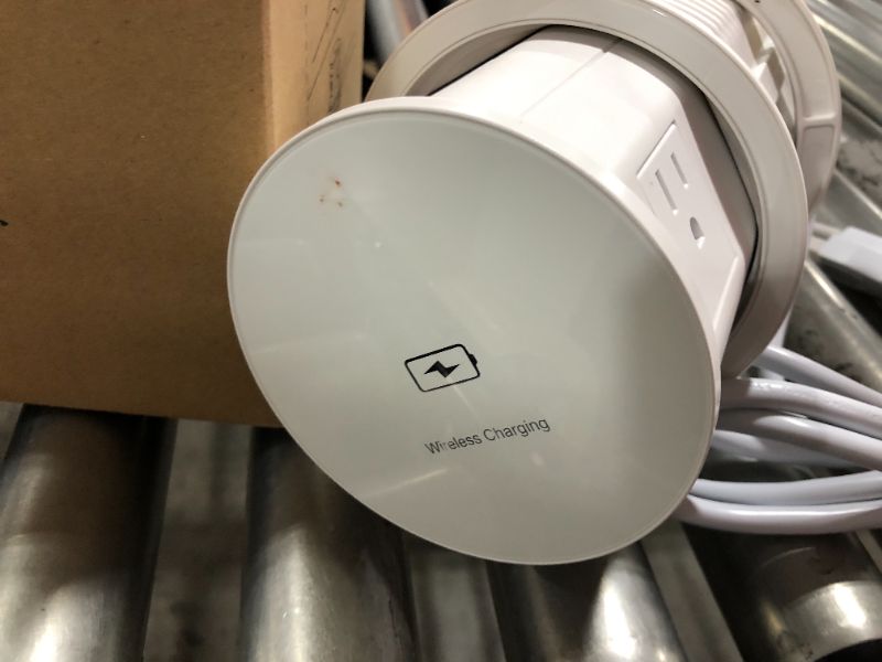 Photo 1 of popup outlet wireless charger 