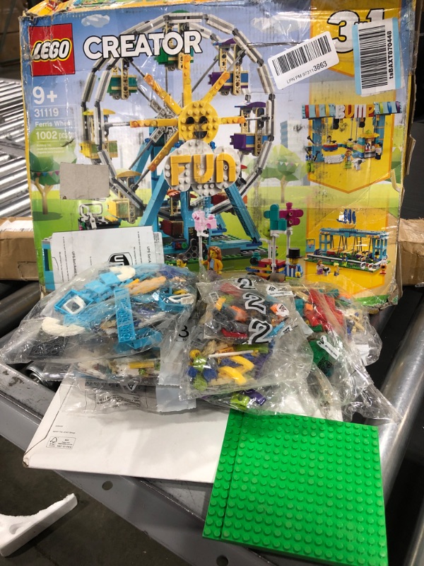 Photo 2 of LEGO Creator 3in1 Ferris Wheel 31119 Building Kit with Rebuildable Toy Bumper Cars, Boat Swing and 5 Minifigures; New 2021 (1,002 Pieces)
