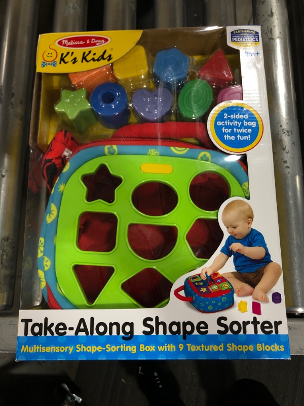 Photo 2 of Melissa & Doug K's Kids Take-Along Shape Sorter Baby Toy With 2-Sided Activity Bag and 9 Textured Shape Blocks
