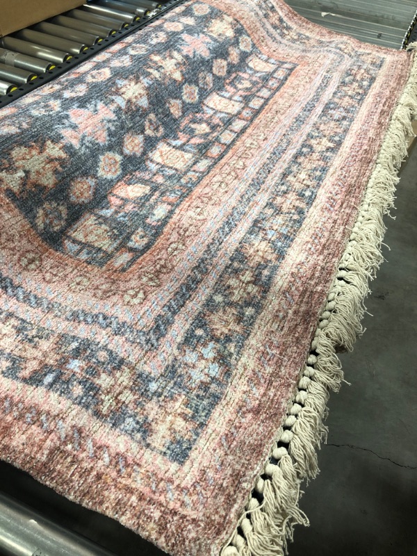 Photo 2 of Area rug multi color with tassels (Size 5' x 7')