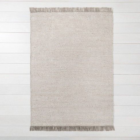 Photo 1 of 5' x 7' Bleached Jute Fringe Area Rug Gray - Hearth & Hand™ with Magnolia