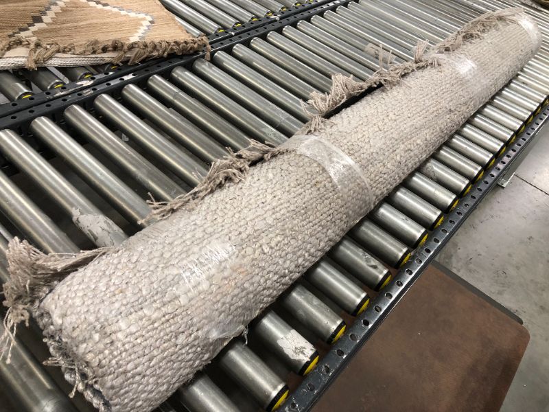 Photo 1 of 5' x 7' Bleached Jute Fringe Area Rug Gray - Hearth & Hand™ with Magnolia