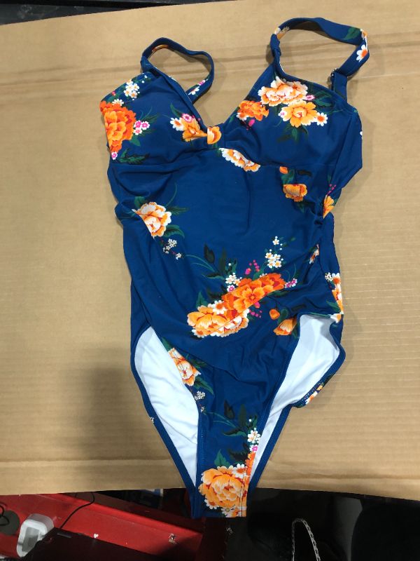 Photo 2 of Blue Floral Cutout One Piece Swimsuit, Size Med.
