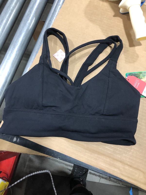 Photo 1 of black sports bra. medium