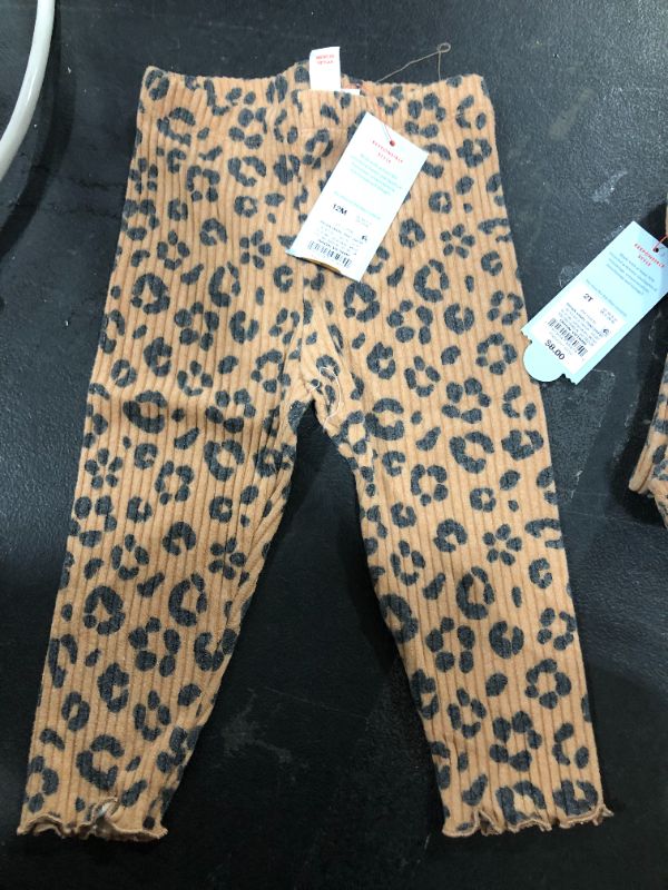 Photo 1 of **PACK OF 2** Cat and Jack, children's brown animal print leggings, size 2T