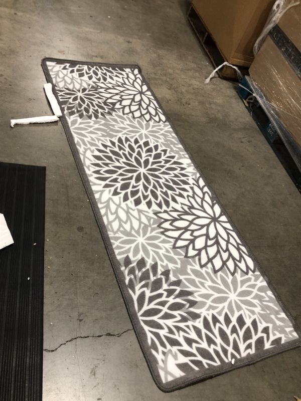 Photo 1 of 70" x 24" grey floral carpet 