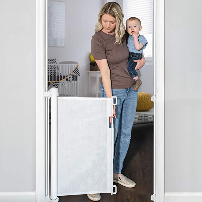 Photo 1 of YOOFOR Retractable Baby Gate, Extra Wide Safety Kids or Pets Gate, 33” Tall, Extends to 55” Wide, Mesh Safety Dog Gate for Stairs, Indoor, Outdoor, Doorways, Hallways (White, 33"x55")

