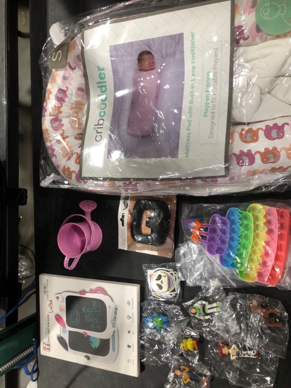 Photo 6 of SMALL FIGURINES  +  LCD DOODLE BOARD  +  NIGHTMARE BEFORE CHRISTMAS STICKERS  +  BIRTHDAY CAKE POP IT  +  CRIB CUDDLER NEWBORN SAFTEY PILLOW FOR CRIB W/ELEPHANT DESIGN   +  FAKE BLACK MUSTACHE   +  SMALL PINK METAL WATERING CAN  