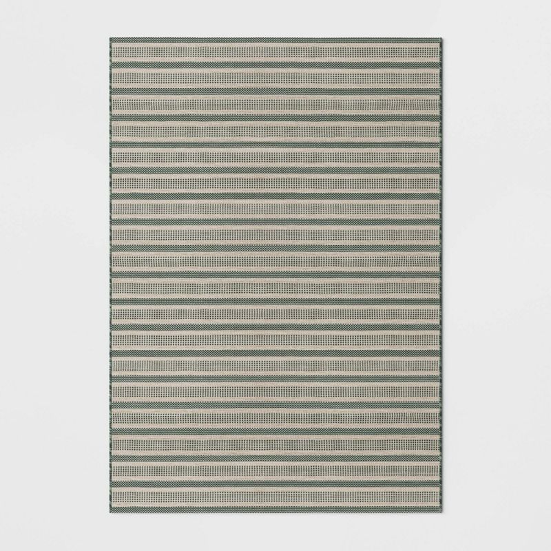 Photo 1 of 7' X 10' Powerloom Stripe Outdoor Rug Sage/Charcoal Gray - Threshold™ Designed with Studio McGee