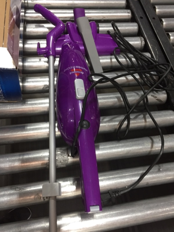 Photo 2 of Bissell Featherweight Stick Lightweight Bagless Vacuum with Crevice Tool, 20334, Purple
