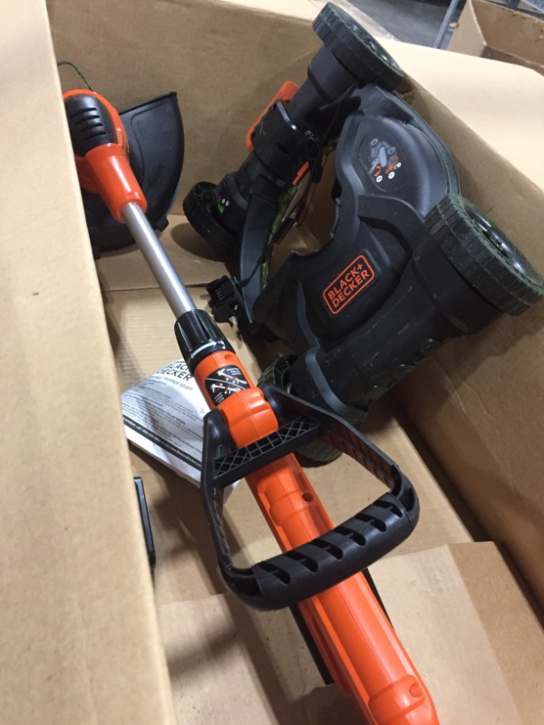 Photo 2 of BLACK+DECKER trimmer/Edger 2 batteries
