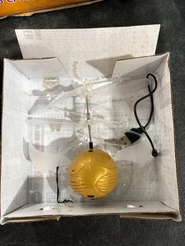 Photo 2 of World Tech Toys Golden Snitch Harry Potter IR UFO Ball Helicopter, Multi
