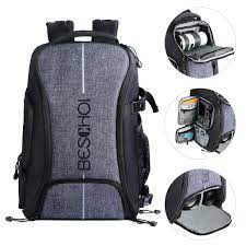 Photo 1 of Camera Backpack, Beschoi Waterproof Camera Bag Photography Bag with Tripod Strap and Rain Cover Large Capacity Rucksack for DSLR Camera, Speedlite Flash, Camera Tripod, Laptops, Lens and Accessories
