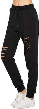 Photo 1 of women's Black Joggers, Fashion Knee Rips. Size Medium **Stock Photo for Refence***