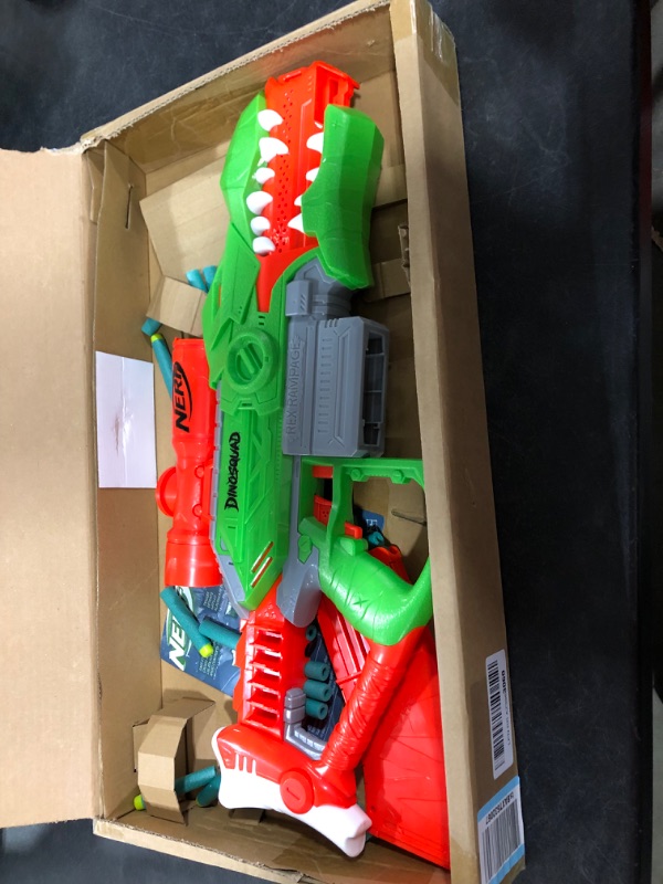 Photo 2 of NERF DinoSquad Rex-Rampage Motorized Dart Blaster, 10-Dart Clip, 20 One Size
