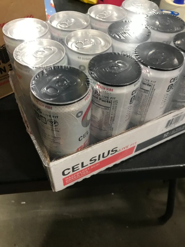 Photo 2 of Celsius Sparkling Energy Drink - No Sugar or Preservatives - Assorted Flavors (12 Drinks, 12 Fl Oz. Each)
*EXPIRED 6/2022**