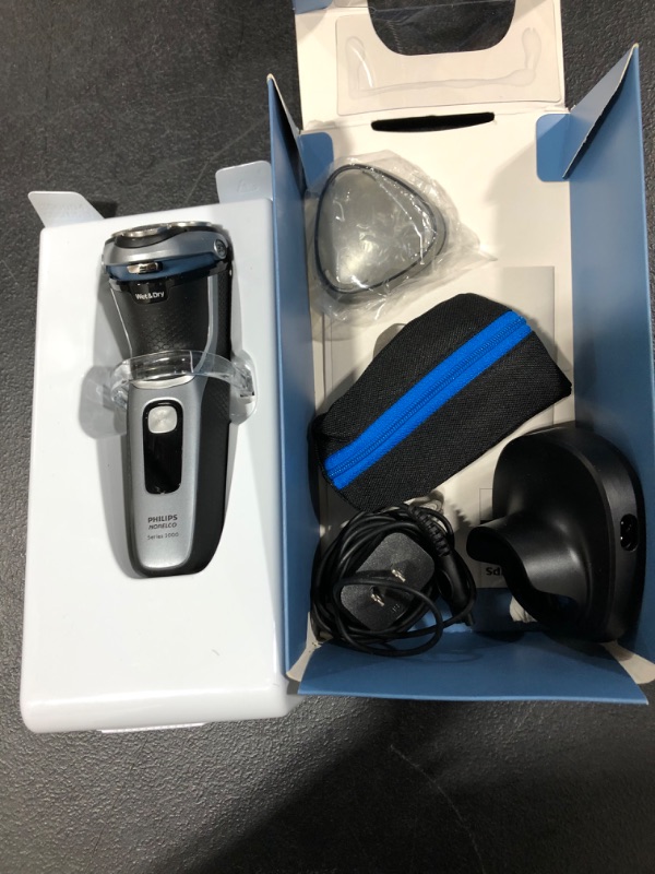 Photo 1 of Philips Norelco Shaver 3800, Rechargeable Wet & Dry Shaver with Pop-up Trimmer, Charging Stand and Storage Pouch, Space Gray, S3311/85
