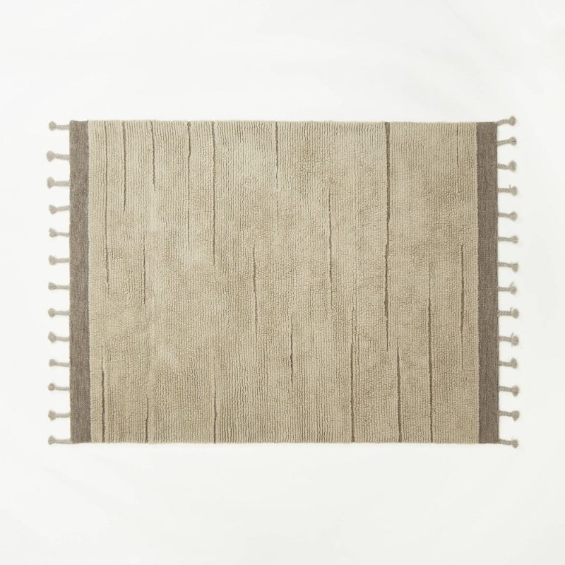 Photo 1 of 7'x10' Rush Valley Wool Tufted Border with Tassels Rug Beige - Threshold™ Designed with Studio McGee
