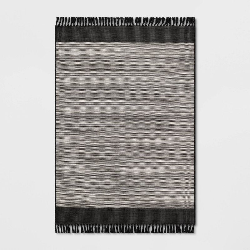 Photo 1 of 5' X 7' Outdoor Rug Striped Fringe Black - Project 62™
