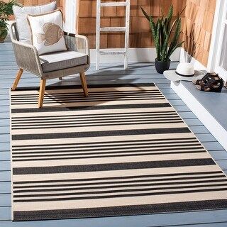 Photo 1 of 6 Ft. -7 in. X 9 Ft. -6 in. Medium Rectangle Indoor-Outdoor Courtyard, Black and Bone, Machine Made Rug