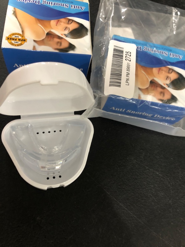 Photo 2 of ANTI SNORING DEVICE 2PC