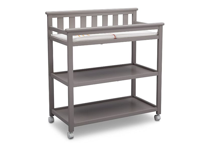 Photo 1 of Delta Children Flat Top Changing Table with Wheels and Changing Pad - Greenguard Gold Certified, Grey
